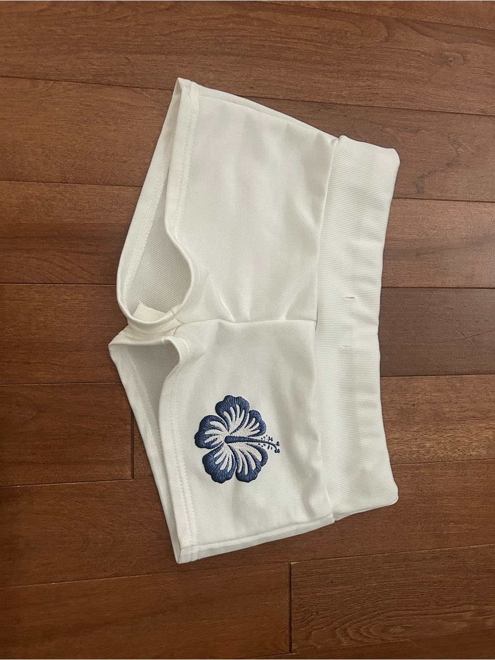 White Women's Athletic Shorts with Blue Floral Embroidery